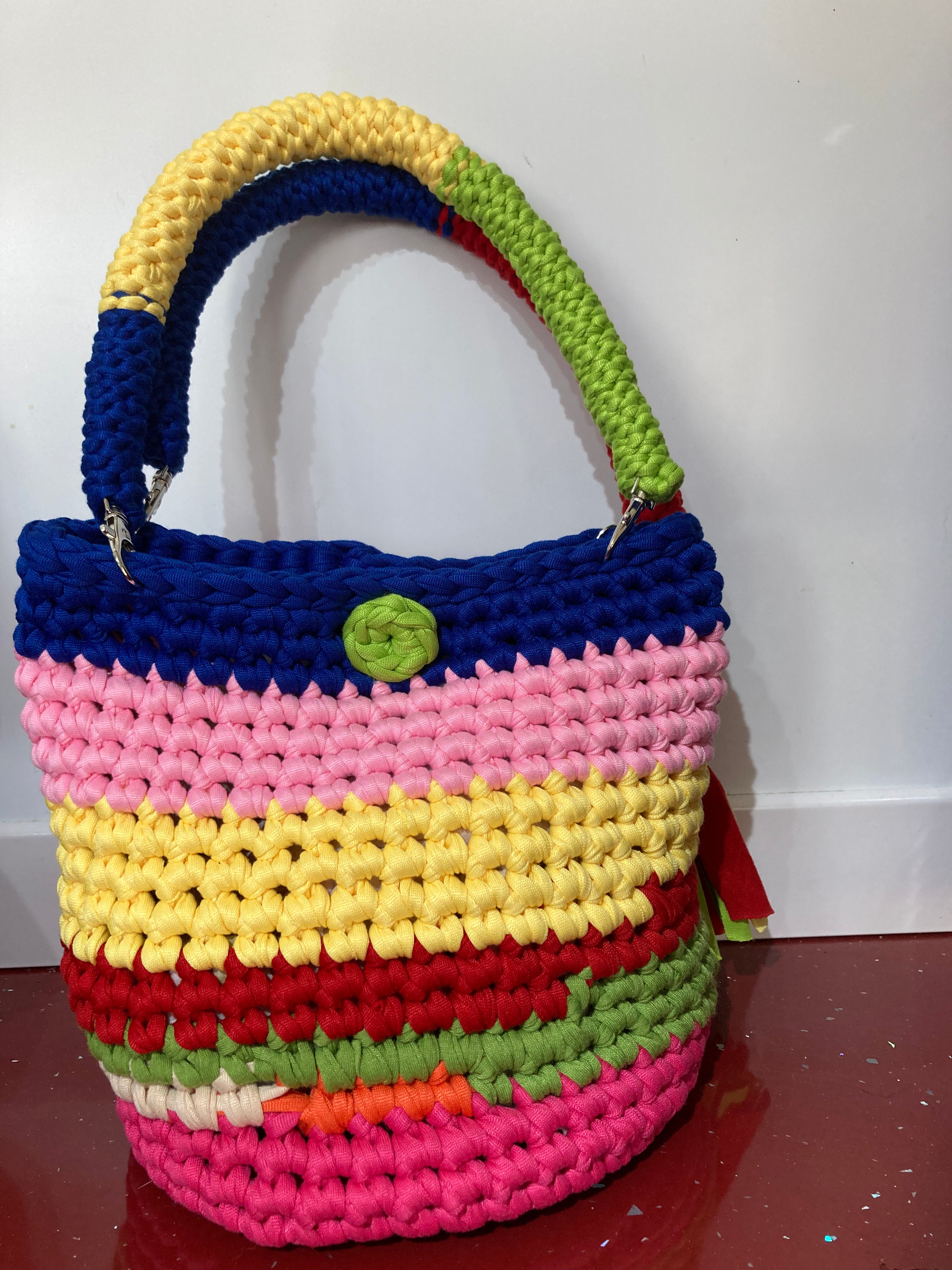 Multi coloured crocheted handbag